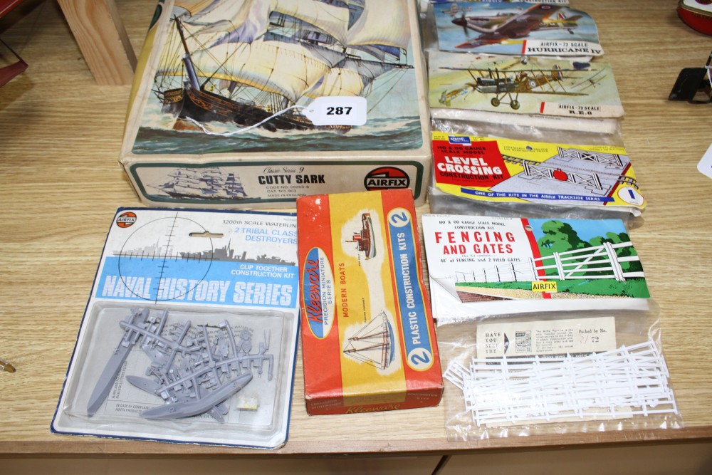 A group of vintage boxed and complete Airfix kits, comprising: Cutty Sark, Bismarck, HMS Ark Royal, LCVP Higgins boat 01321, OO Booking